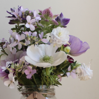 Seasonal jam jar arrangements of locally grown cut flowers from Faversham, Kent - Greenfinch and Robin